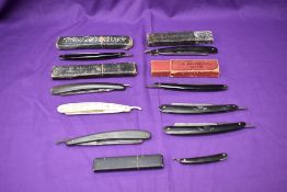 A collection of nine vintage Cut Throat Razors including Butler's Keen, two Crown & Sword