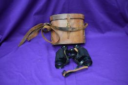 A pair of World War Two Air Ministry binoculars, by Wray of London, numbered 6E/293 above AM