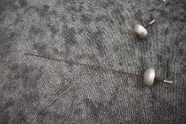 A pair of Fencing Foils by Paul, blade length 87cm