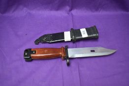 A Russian Bayonet for the AK Series of Rifles, plastic grip, wire cutter scabbard, blade length
