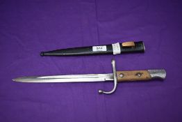 A Turkish Mauser Model 1903 Short Bayonet with metal scabbard, Turkish marks on crossguard and