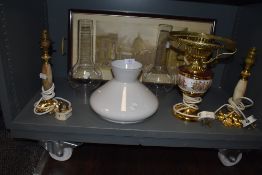 An assortment of lamps and shades and a vintage tray depicting The post office,St Pauls Cathedral
