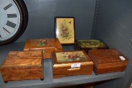A collection of vintage jewellery boxes, some hand painted and another with inlaid scene.