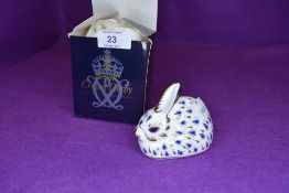 A Royal Crown Derby rabbit having silver stopper,with box.