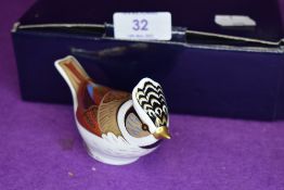 A Royal Crown Derby goldcrest paper weight having gold stopper,with box.