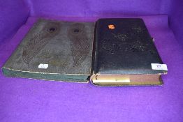 Two antique albums containing a selection of interesting late Victorian and Edwardian photographs of