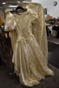 A retro wedding dress having beading and sequin details,small size.