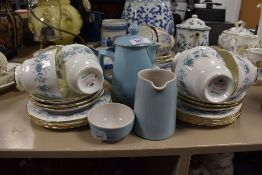 A selection of teacups and saucers by Colclough in the Braganza design