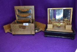 Two vintage cigarette boxes, one having inlaid detailing,integrated ashtrays and later additions