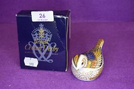 A Royal Crown Derby Firecrest paper weight having gold stopper,with box.