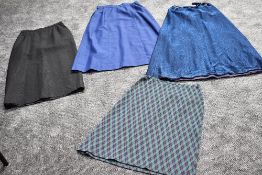 A selection of vintage maxi skirts and similar, mainly 1960s.