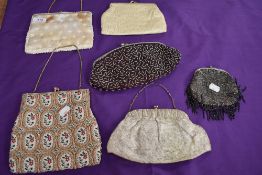 A collection of vintage evening bags, beaded and embroidered examples amongst this lot,