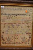 A Victorian embroidered sampler having biblical quote,alphabet and more by Sarah Ann Bowman March