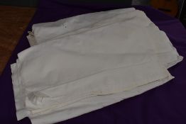 A selection of vintage white flat sheets.