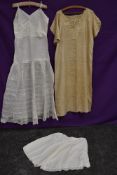 A Chinese 1920s silk nightdress, a set of early 20th century knickers with lace detailing and a full