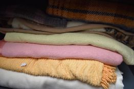 Seven vintage and retro bed covers,throws and blankets.