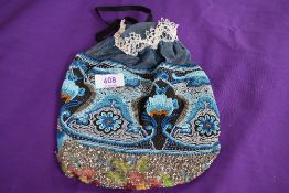 An extensively beaded drawstring evening bag having a variety of colourful patterns interwoven