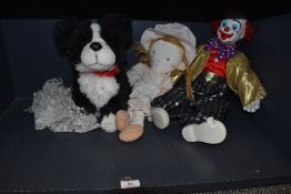 A retro clown, a rag doll and a cuddly toy dog.