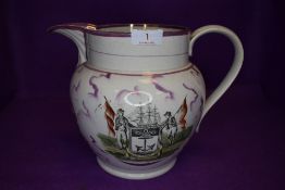 A large Victorian Sunderland ware lustre jug having quotation to reverse,bridge scene under spout