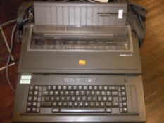 An electric Olivetti typewriter having dust cover