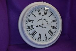 A vintage style Paddington London wall clock.
