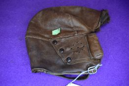 A vintage leather flying cap or helmet having fur lining,around 1920s/30s.