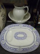 A large white glazed water jug and bowl set and similar charger