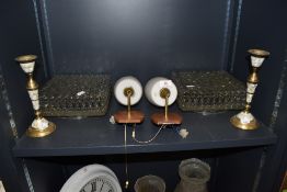 A selection of vintage lamps and shades and two candle sticks.