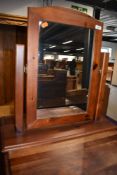 A modern pine dressing table mirror