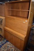 A mid Century part teak bureau bookcase of stylised form, width approx. 91cm