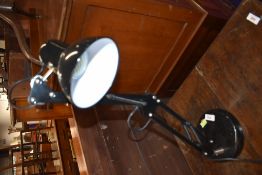 A traditional angle poise lamp
