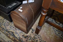 A Singer sewing machine in wooden case
