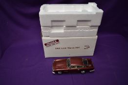 A Danbury Mint 1:24 scale diecast model, 1964 Aston Martin DB5, in original box