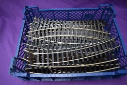 A collection of Rivarossi plastic 0 gauge track, most curved