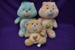 Three 1980's Care Bears, Friend Bear, Bedtime Bear both heights 32cm and Champ Bear height 18cm