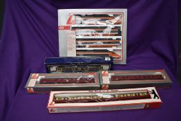 A small collection of Lima 00 gauge comprising TGV SNCF Passenger Train set, boxed 149720, DSB 2 Car
