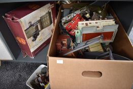 A shelf of 00 gauge Buildings and Accessories including Lledo Brewing in Britain in box