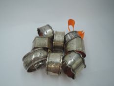 Eight HM silver napkin rings of various designs, approx 149g