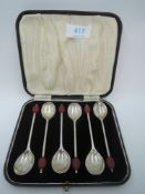 A cased set of six silver coffee spoons having red coffee bean knops, Sheffield 1938, Viner's Ltd,