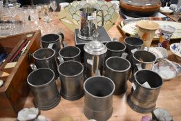 A collection of predominantly antique tankards, a lot being 19th century, possibly ale house or