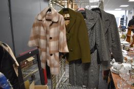 Four ladies vintage and retro coats, a variety of sizes and styles.