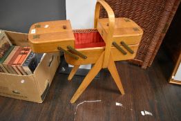 A 1950's sewing box or case in golden oak manufactured by Morco in great condition