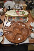 A large wooden revolving snack dish or party tray and similar sized bowl and plate