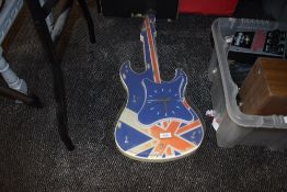 A wall clock in the style of a guitar having Union jack flag design AF