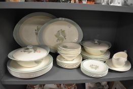 A partial dinner service 'Woodbury' by Wedgwood, platters,bowls, tureens and more amongst this
