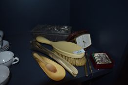 A miscellany of items including shoe horns, Smiths travel clock, Brooch with Lupin decoration,a