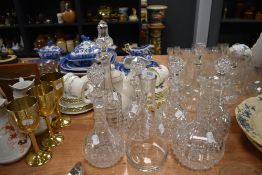 A selection of Victorian crystal cut glass decanters including three matching examples with stoppers
