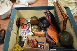 A mixed lot of items including ash trays, badges, gramophone needle tin with some needles,