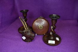 Two vintage barley twist candle sticks, a tape measure and novelty black country style animal head