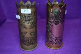A pair of first world war military ammunition shells decorated as trench art